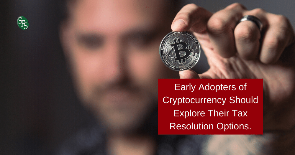 man holding bitcoinarly Adopters of Cryptocurrency Should Explore Their Tax Resolution Options